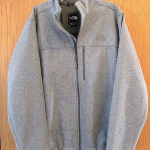 Light gray men’s The North Face jacket, size XL.
